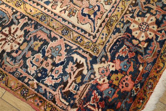 A Persian red ground carpet with pole medallion 372 x 255cm